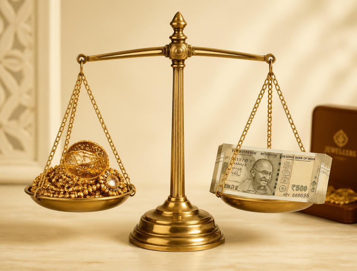 Weighing scale with gold ornaments and cash